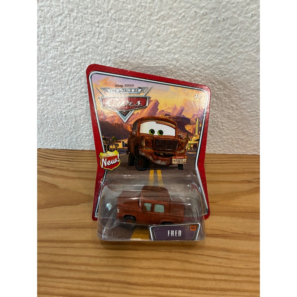 Disney Pixar Cars Fred Die-Cast Vehicle Mattel World of Cars Rusty Car 44 New